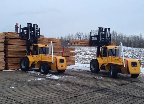 Forklifts and stacked Access Matting mats in the Leduc yard